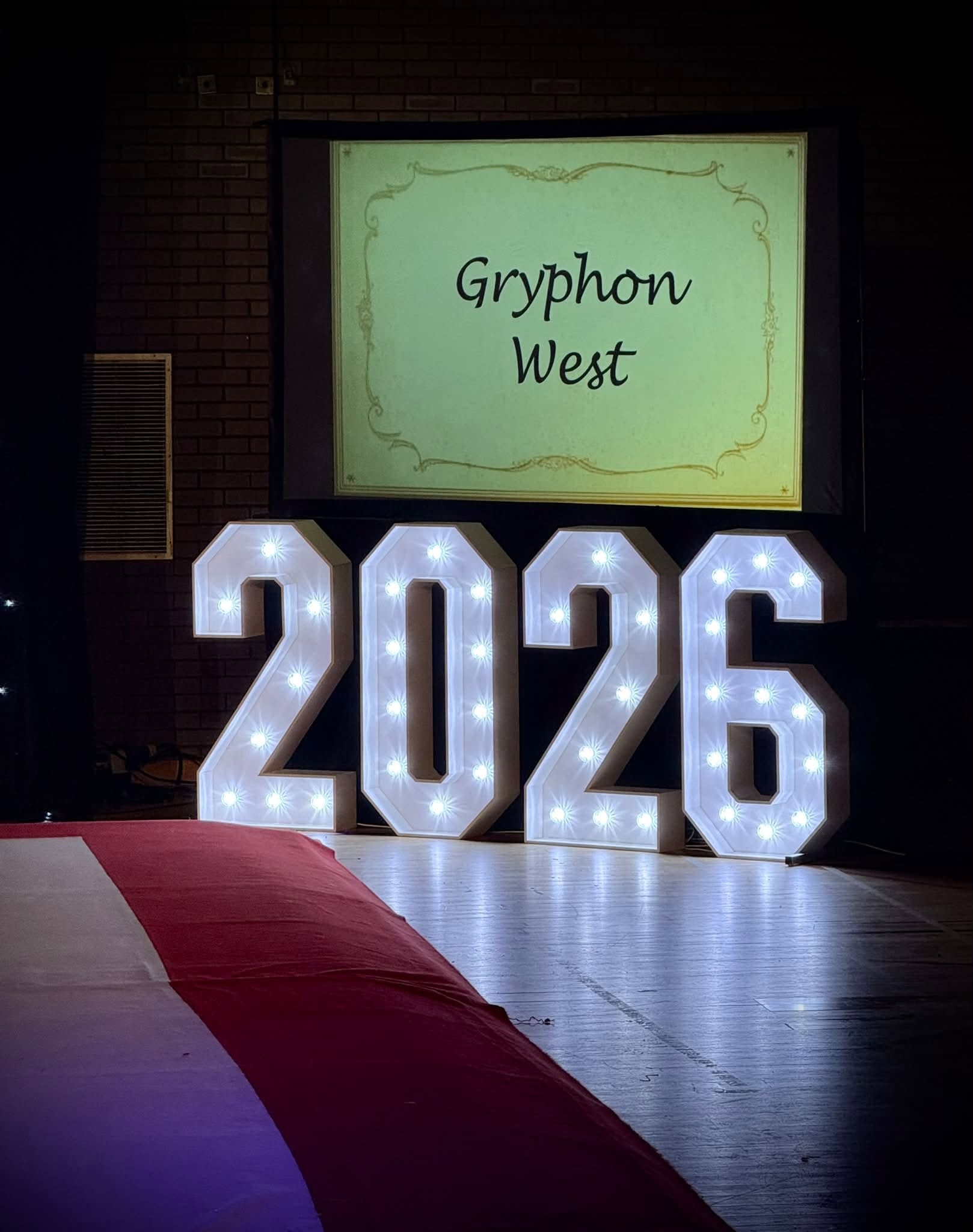 Gryphon West 2026 illuminated sign at London Festival of Gymnastics